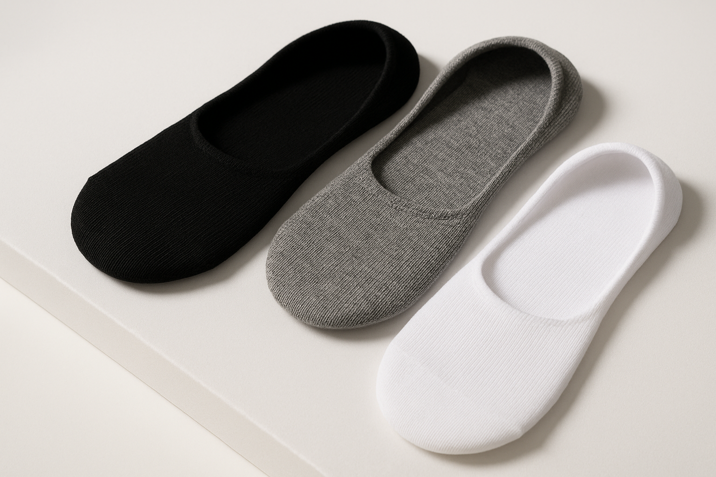 Black, grey, and white socks