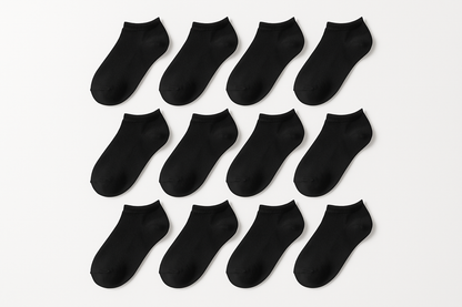 12 pairs of plain black low cut socks on white background